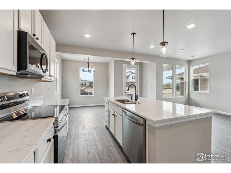 Furnished interior view inside a new home in Parkway at Prairie Center Village, Brighton (Image 5).