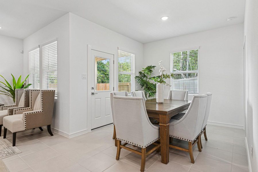 Sun-lit dining area Sun-lit dining area