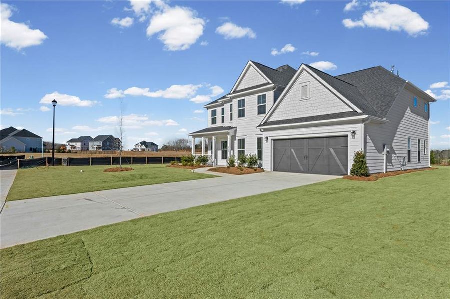 Front exterior of a new home in Creekside at Skelton, Jefferson, GA, highlighting curb appeal (Image 27).
