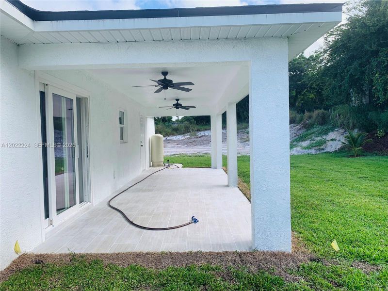 Exterior details and patio area of a home in , Lake Placid (Image 3).