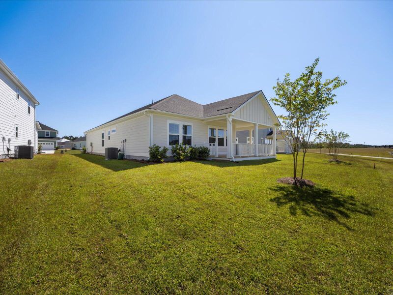 Exterior details and patio area of a home in The Coves at Lakes of Cane Bay, Summerville (Image 4). Exterior details and patio area of a home in The Coves at Lakes of Cane Bay, Summerville (Image 4).