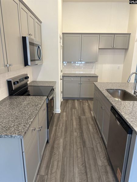 Furnished interior view inside a new home in Piney Woods Bluff, Columbia (Image 6).