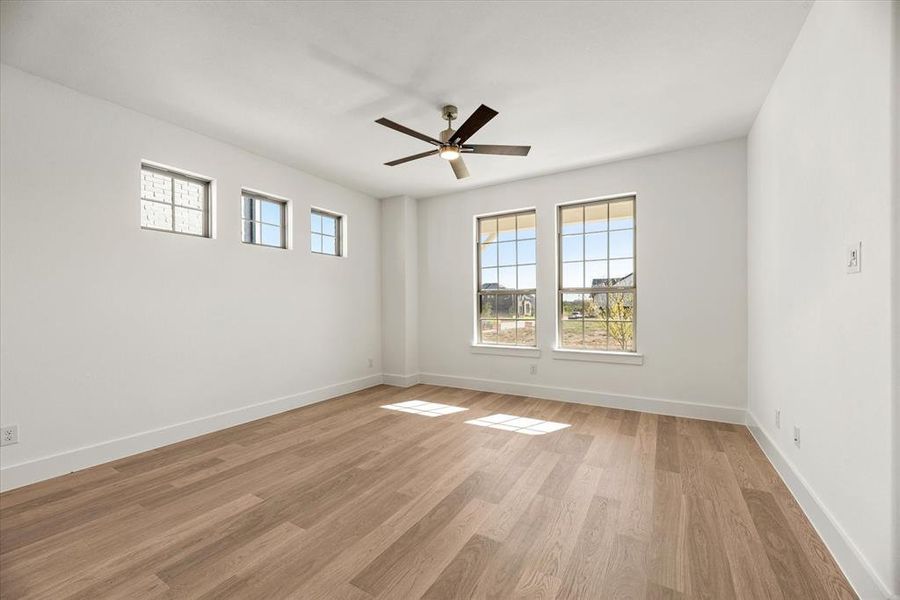 This goregous home provides walls of windows to let the sunshine in!