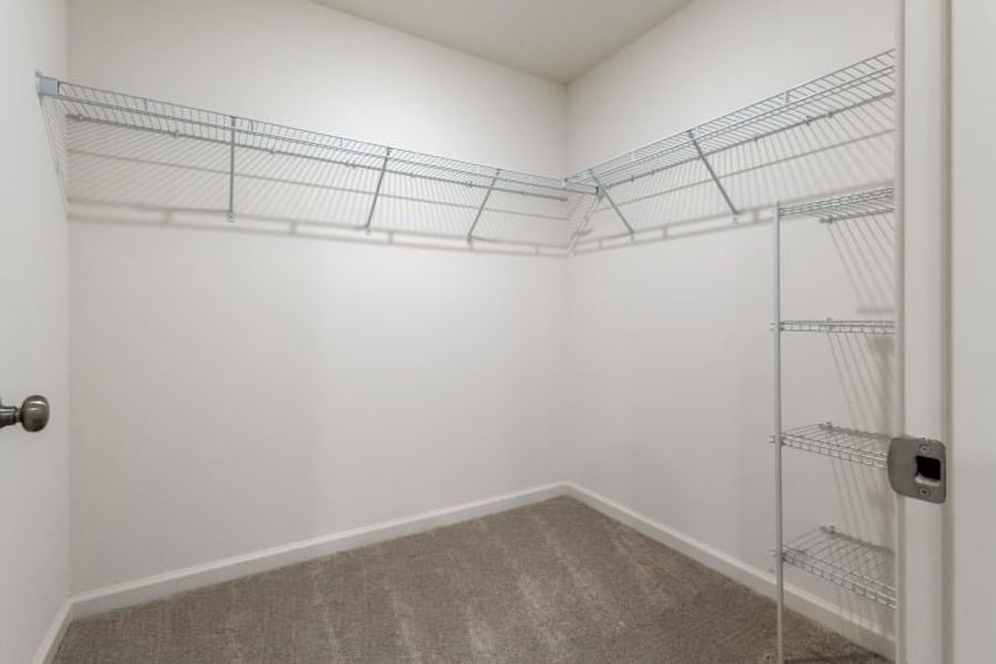 A room with a ladder and a metal ladder.