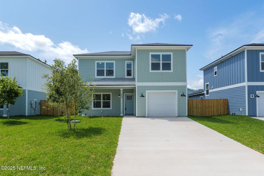 Front exterior of a new home in , St. Augustine, FL, highlighting curb appeal (Image 21).