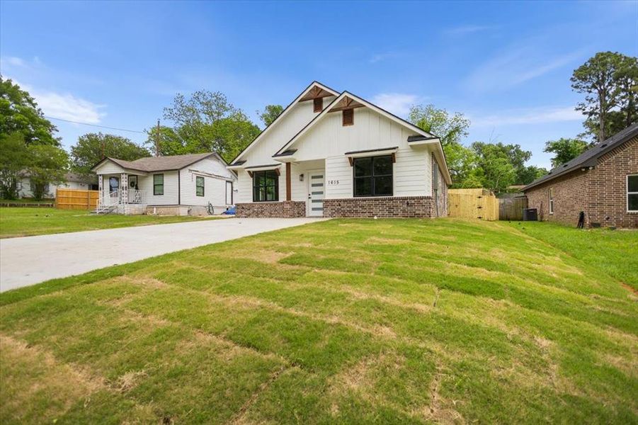 Front exterior of a new home in , Tyler, TX, highlighting curb appeal (Image 17).