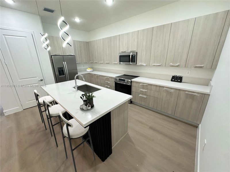 Furnished interior view inside a new home in , Davie (Image 16).