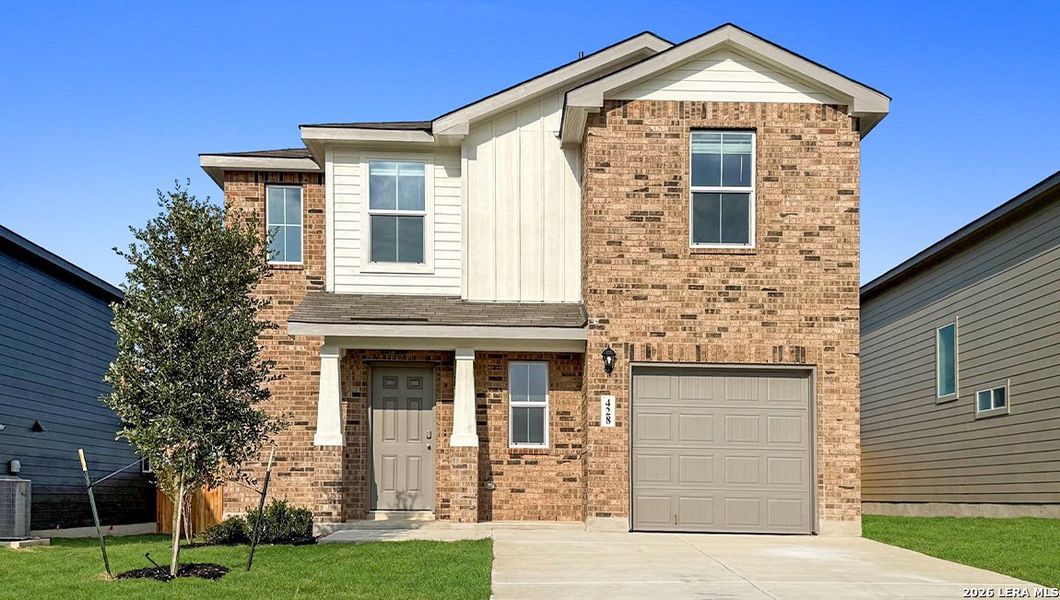 Front exterior of a new home in Redbird Ranch, San Antonio, TX, highlighting curb appeal (Image 2). Front exterior of a new home in Redbird Ranch, San Antonio, TX, highlighting curb appeal (Image 2).