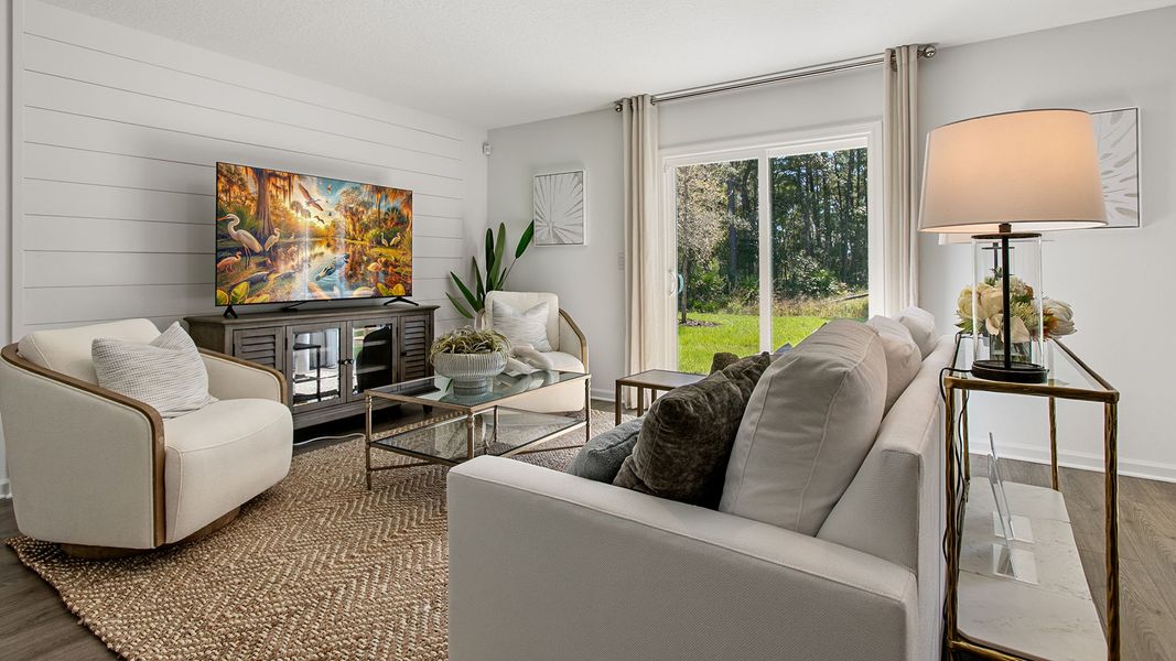 Representative furnished interior of a home built from the HAYDEN II by D.R. Horton in Copes Landing, Jacksonville (Image 13).