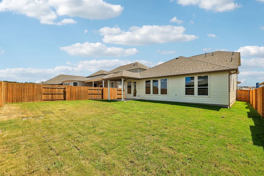 Exterior details and patio area of a home in Freedom at Anthem, Kyle (Image 4).