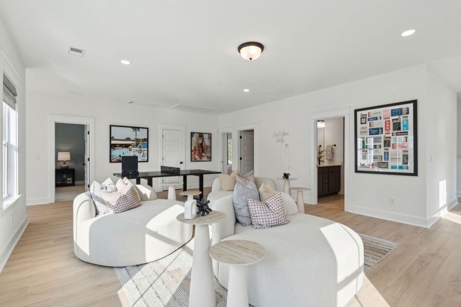 Furnished interior view inside a new home in Tidewater at Lakes of Cane Bay, Summerville (Image 14).