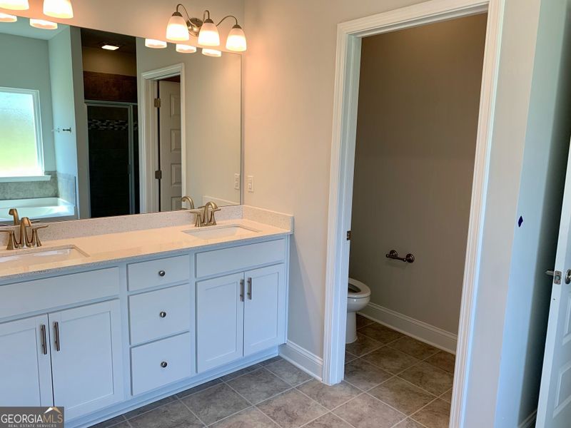 Furnished interior view inside a new home in Barrington Place, Macon (Image 3).