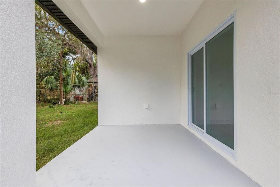 Exterior details and patio area of a home in , Tampa (Image 3).