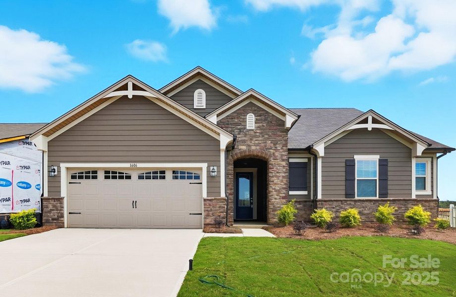 Front exterior of a new home in Waxhaw Landing, Monroe, NC, highlighting curb appeal (Image 1). Front exterior of a new home in Waxhaw Landing, Monroe, NC, highlighting curb appeal (Image 1).