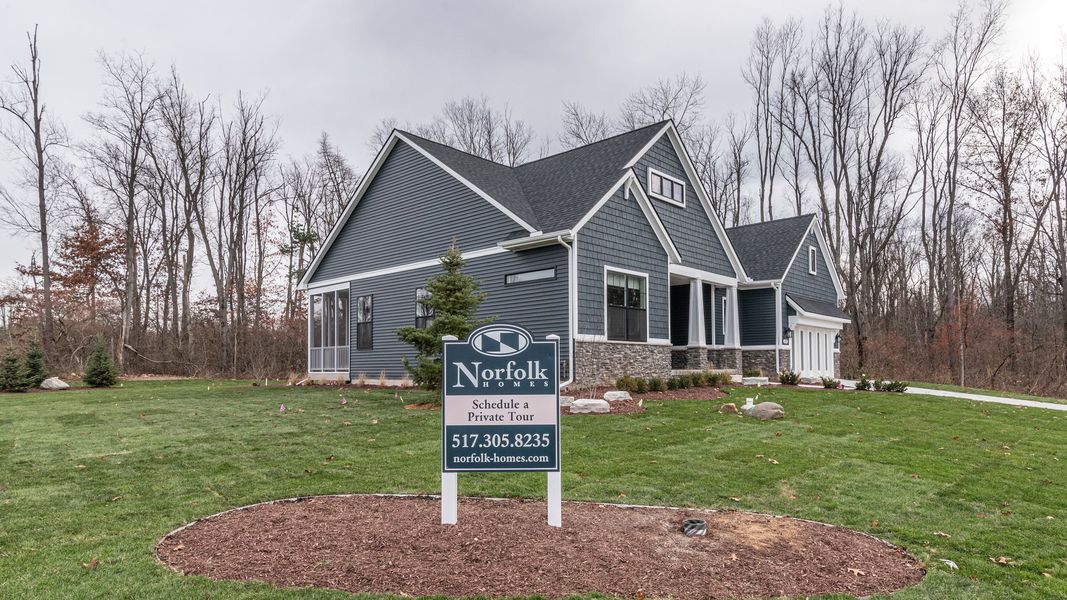 Front exterior of a new home in Preserve at Magnolia Park, Jackson, MI, highlighting curb appeal (Image 27).
