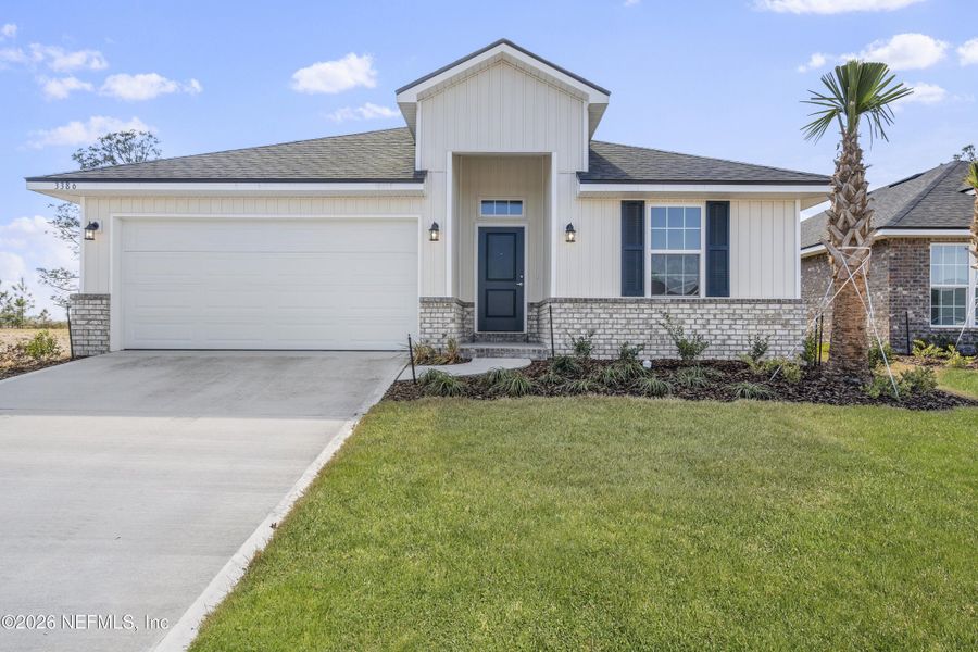 Front exterior of a new home in , Green Cove Springs, FL, highlighting curb appeal (Image 1). Front exterior of a new home in , Green Cove Springs, FL, highlighting curb appeal (Image 1).