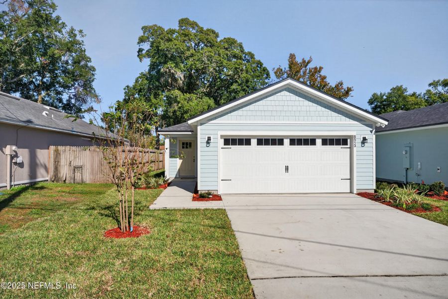 Front exterior of a new home in , Jacksonville, FL, highlighting curb appeal (Image 1). Front exterior of a new home in , Jacksonville, FL, highlighting curb appeal (Image 1).