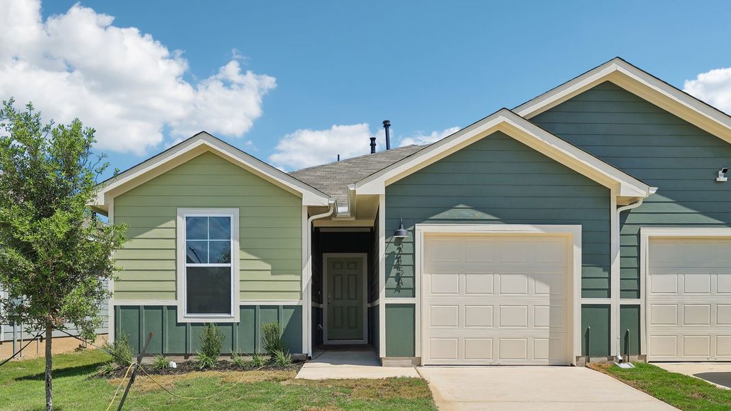 Front exterior of a new home in Wayside, Uhland, TX, highlighting curb appeal (Image 18).