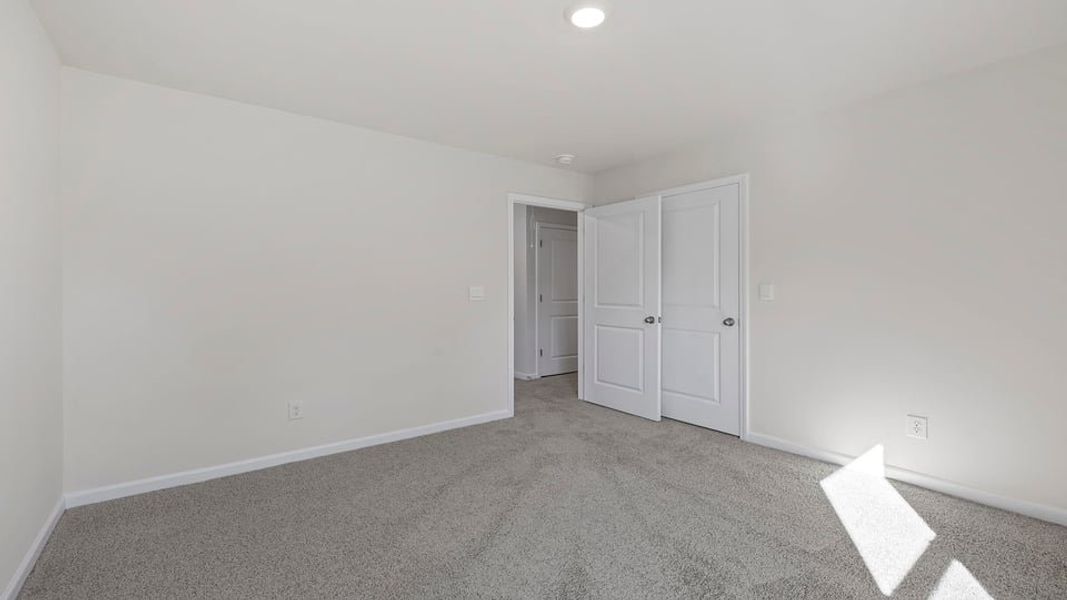 Spacious, unfurnished interior of a new home in Durbin Meadows, Fountain Inn (Image 22).