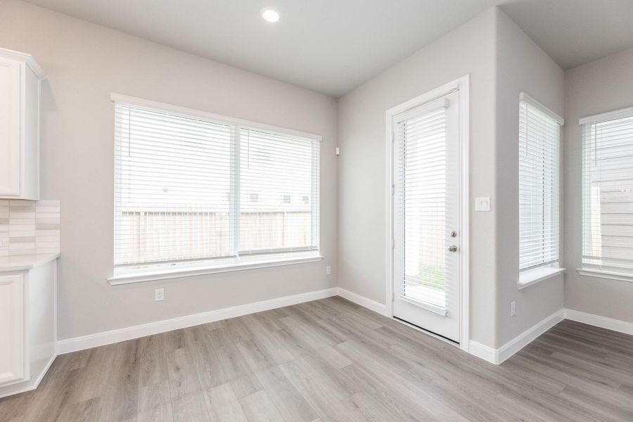 Spacious, unfurnished interior of a new home in Dunvale Village - Patio Home Collection, Houston (Image 10).
