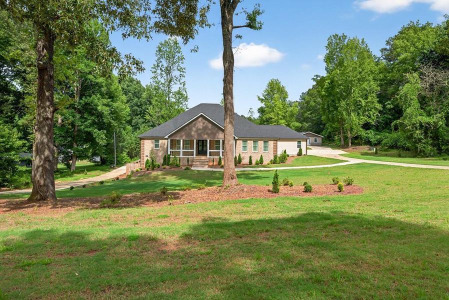 Front exterior of a new home in , Oxford, GA, highlighting curb appeal (Image 25).