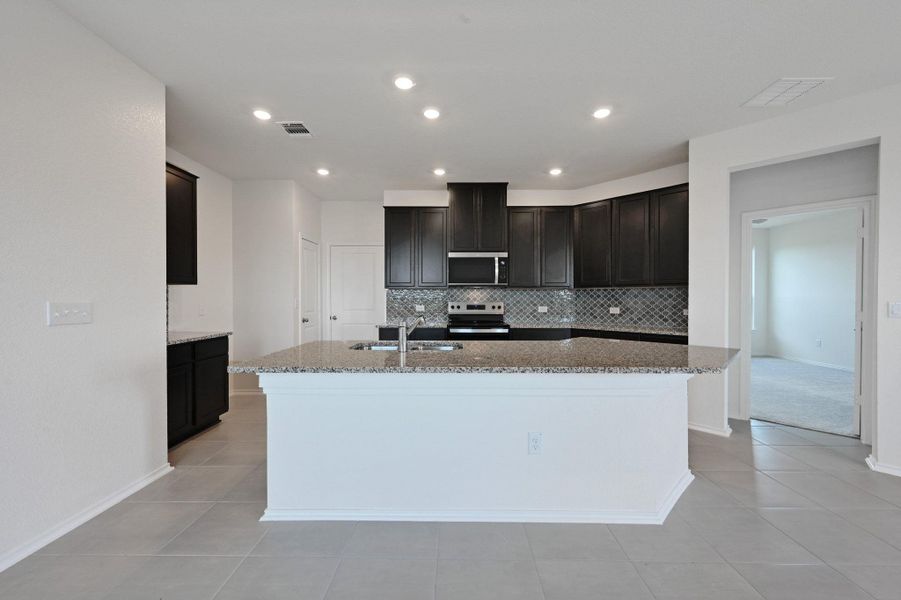 Furnished interior view inside a new home in Stoney Chase, Del Valle (Image 8).