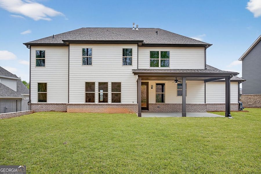 Exterior details and patio area of a home in The Manor at Gainesville Township, Gainesville (Image 3).