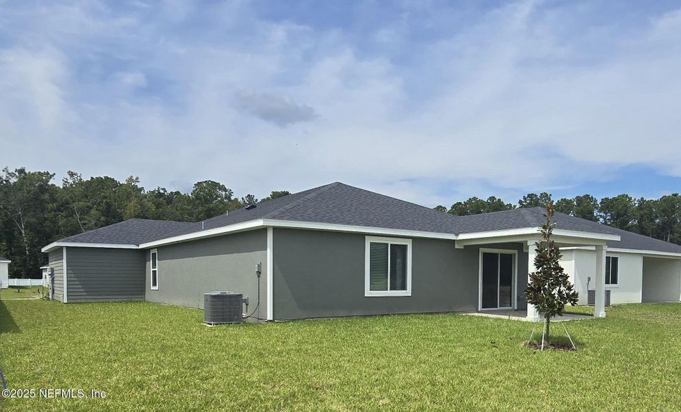 Front exterior of a new home in Azalea Creek, Jacksonville, FL, highlighting curb appeal (Image 2).
