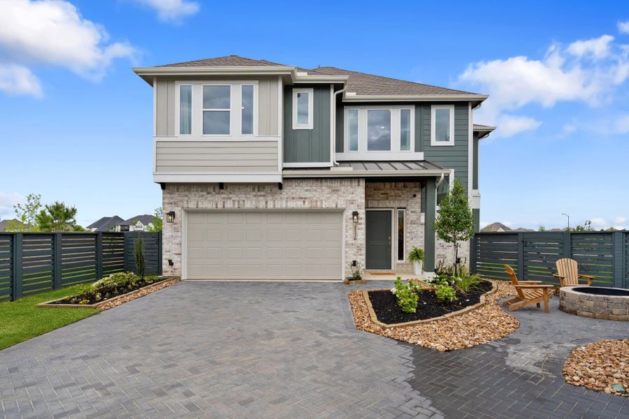 Front exterior of a new home in Bridgeland, Cypress, TX, highlighting curb appeal (Image 21).