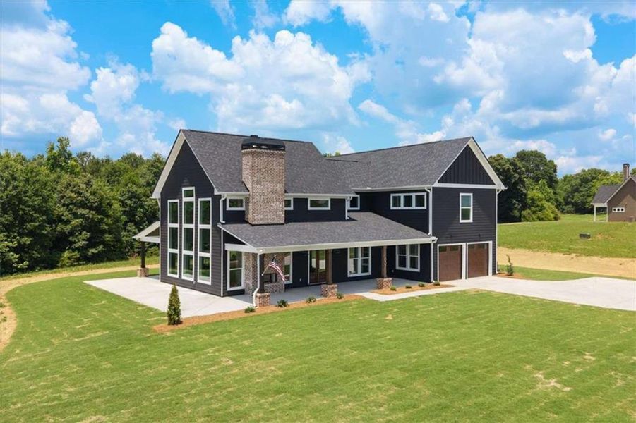 Front exterior of a new home in , Roopville, GA, highlighting curb appeal (Image 33).