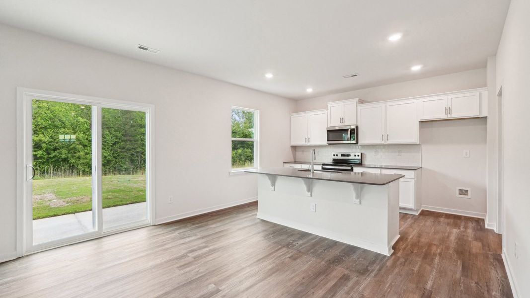 Furnished interior view inside a new home in Reedy Creek Preserve, Charlotte (Image 7).