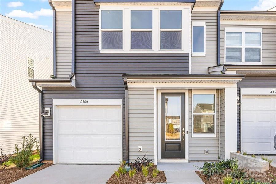 Covered Front Entry and One Car Garage. Covered Front Entry and One Car Garage.
