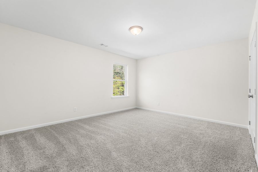 Representative unfurnished interior of a home built from the The Gwinnett by Smith Family Homes in Settlers Hammock, Kingsland (Image 30).