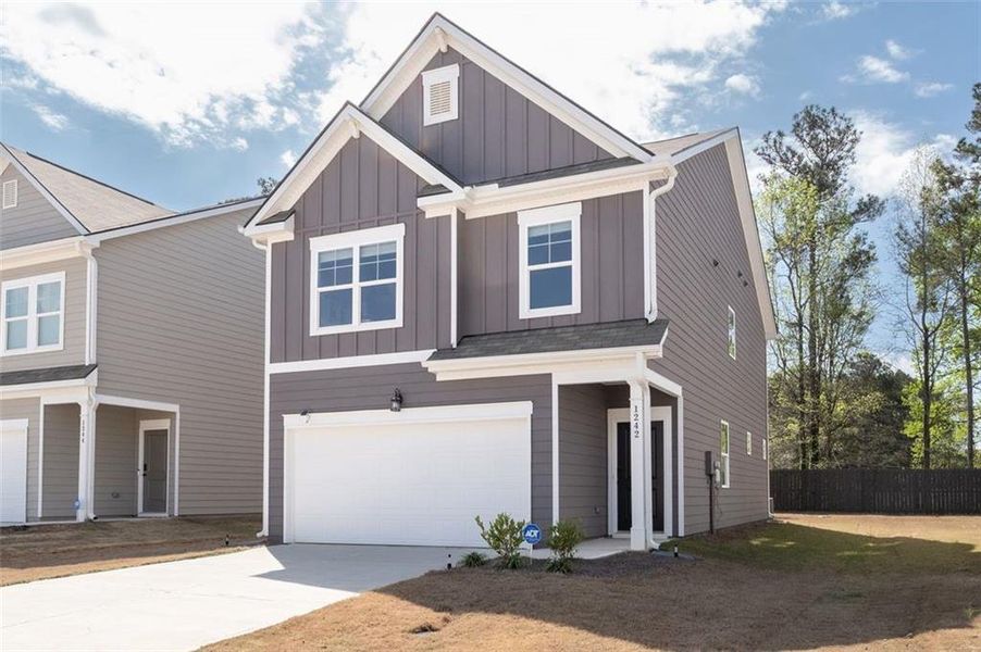 Front exterior of a new home in Walden Park - The Retreat, Jonesboro, GA, highlighting curb appeal (Image 26).