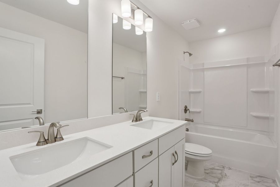 Furnished interior view inside a new home in Station Hill - Reserve Series, Franklin (Image 8).