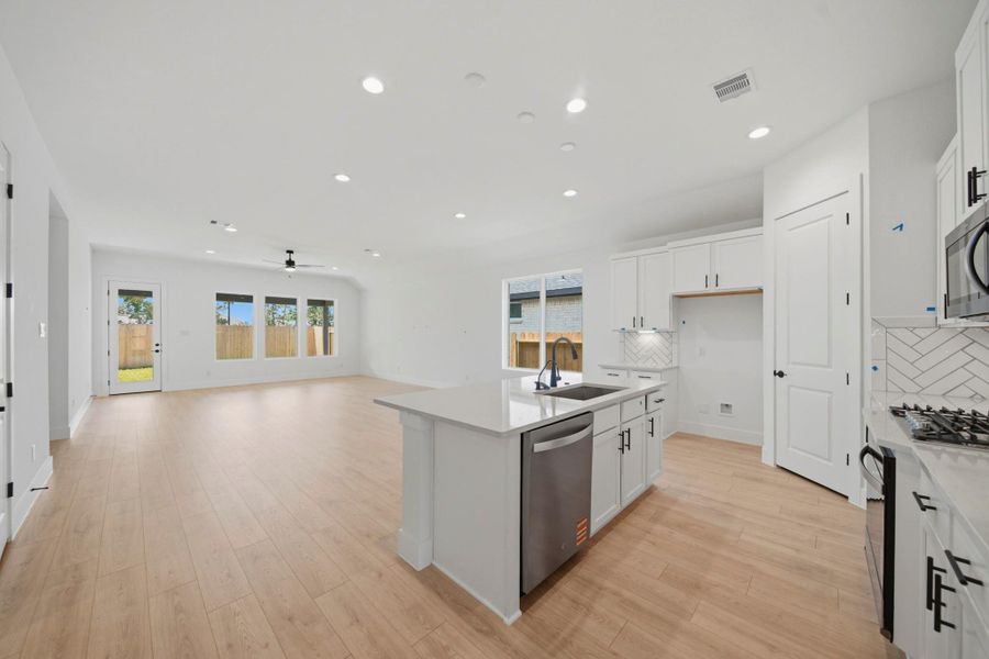 Furnished interior view inside a new home in Mill Creek Estates, Magnolia (Image 6).