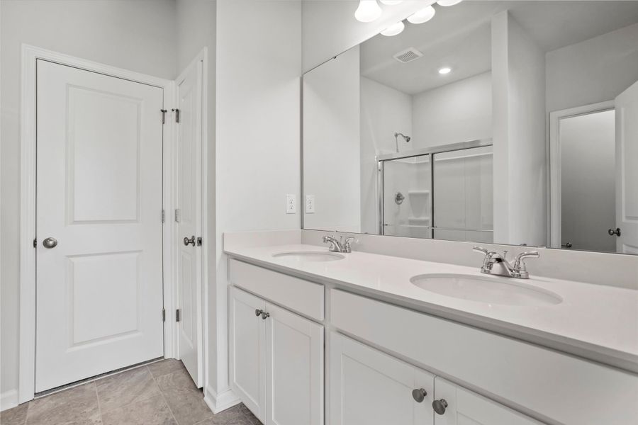 Furnished interior view inside a new home in West Main Townhomes, Sanford (Image 9).