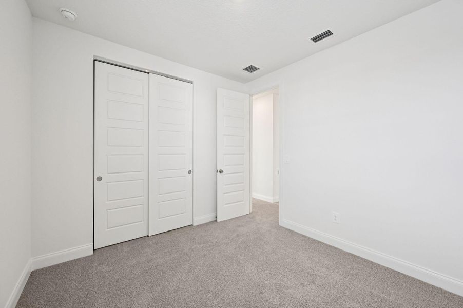 Spacious, unfurnished interior of a new home in Brystol at Wylder - Reserve Series, Port St. Lucie (Image 23).