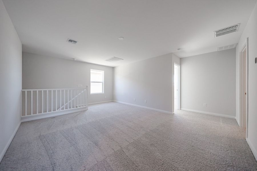 Spacious, unfurnished interior of a new home in Teravalis, Buckeye (Image 16).