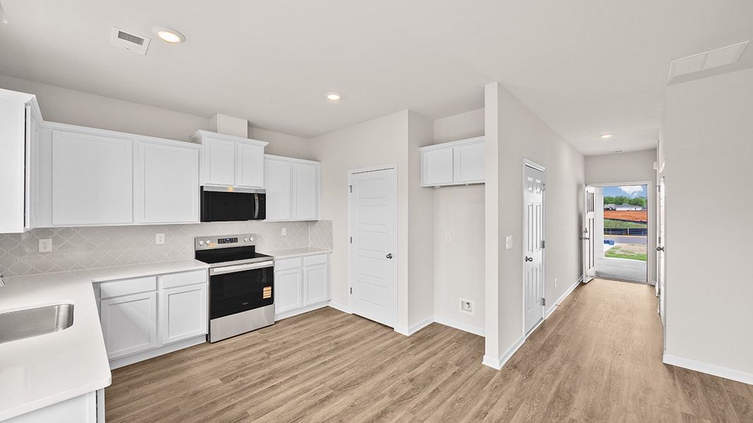 Furnished interior view inside a new home in Remington Chase, Perry (Image 6).