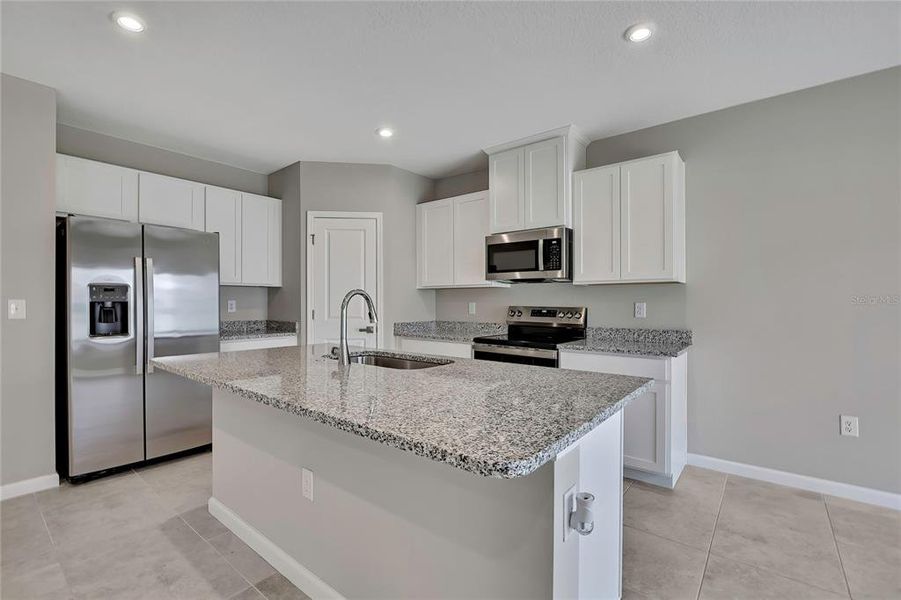 Furnished interior view inside a new home in , Sumterville (Image 8).
