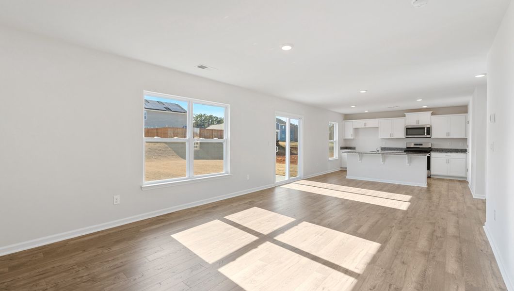 Spacious, unfurnished interior of a new home in Magnolia at the Bluffs Phase 3, Freeport (Image 21).