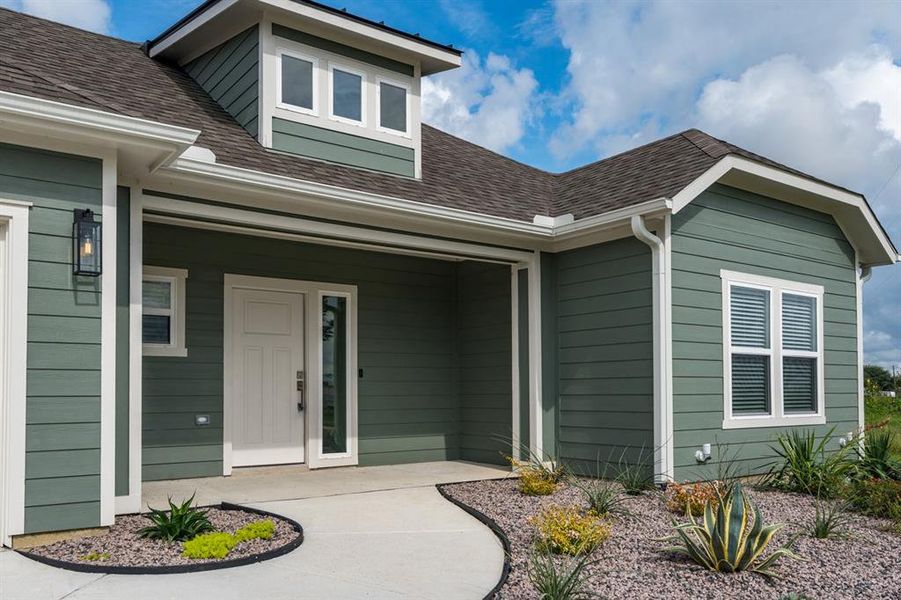 Entrance to property with covered porch