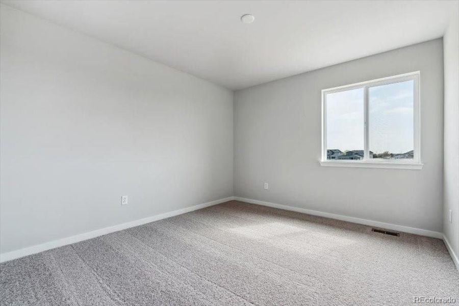 Spacious, unfurnished interior of a new home in Red Barn Meadows, Mead (Image 13).