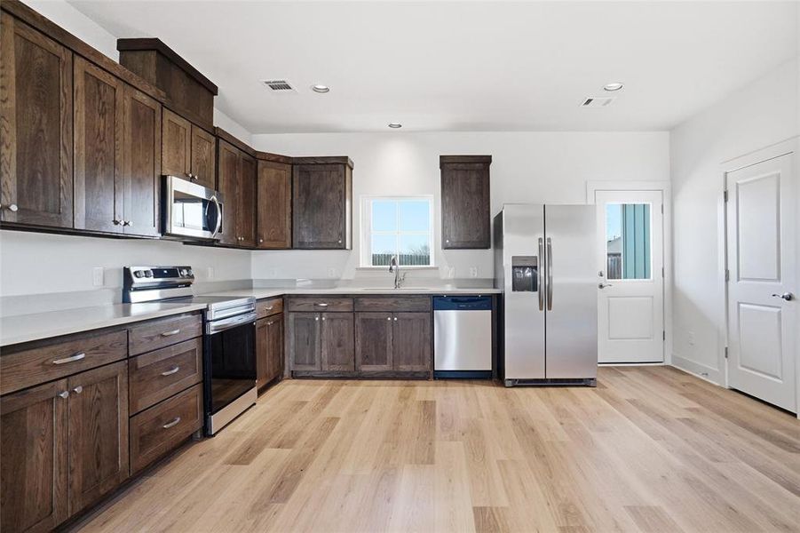 Furnished interior view inside a new home in , Sanger (Image 6).