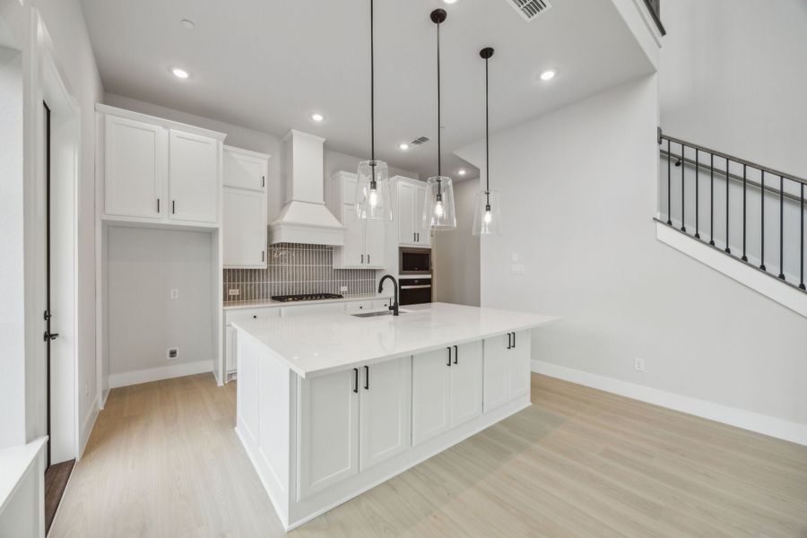 Furnished interior view inside a new home in Newman Village Townhomes, Frisco (Image 4).