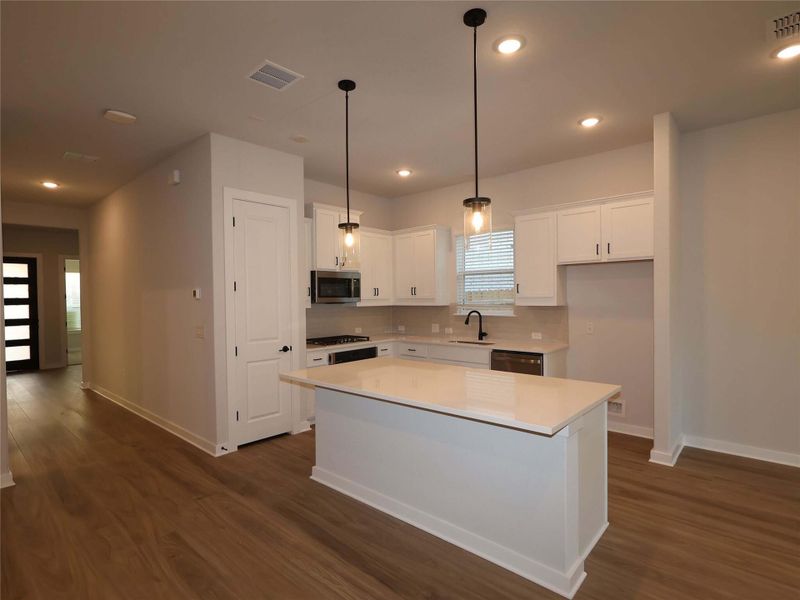 Furnished interior view inside a new home in Cedar Brook, Leander (Image 11). Furnished interior view inside a new home in Cedar Brook, Leander (Image 11).