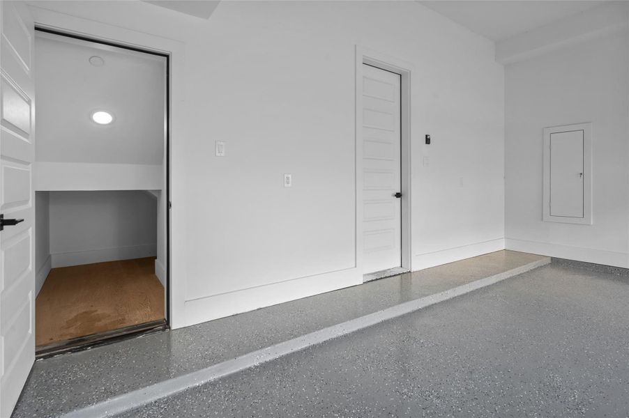 View of additional storage in garage