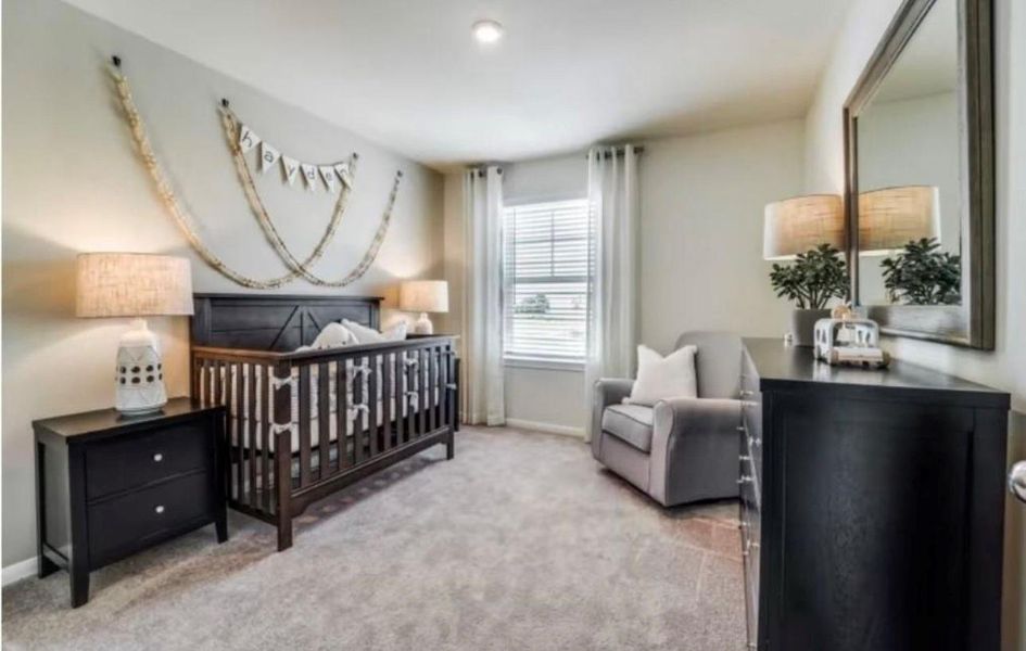 Furnished interior view inside a new home in The Pines At Seven Coves, Conroe (Image 9).