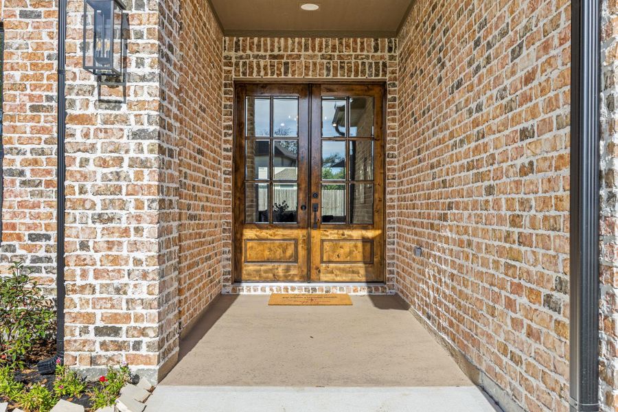 Exterior details and patio area of a home in , Tomball (Image 3).